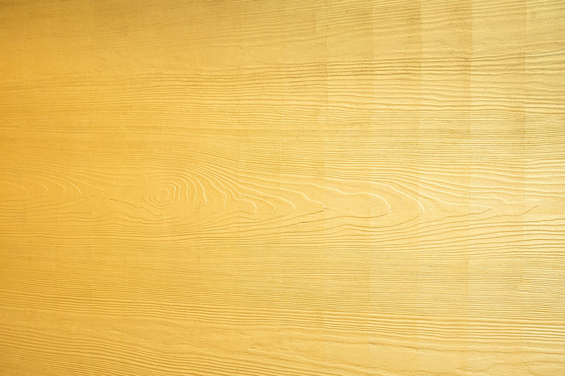 Detail mit vergoldeter Holzmaserung